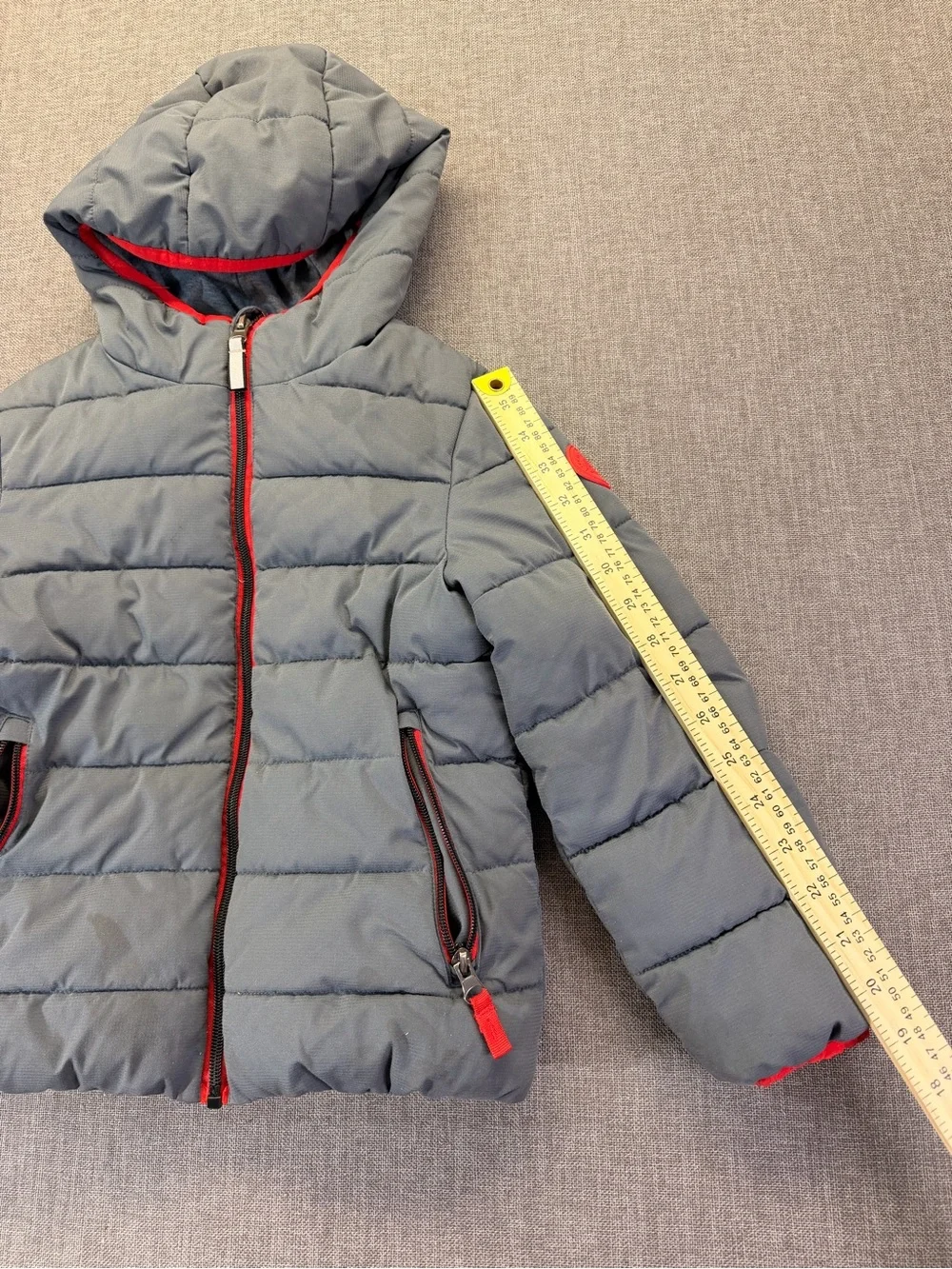 Gray Quilted Hooded Puffer Jacket with Red Trim size 6 kids.